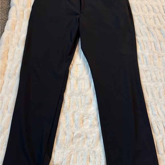 Under Armour Black golf pants and 2 Travis Mathews Polo Shirts - Picture 4 of 8